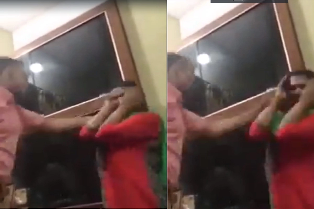 Video of suspended IPS slapping woman